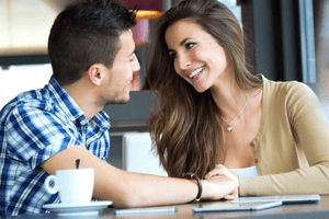 a woman trying to seduce a Scorpio man in a cafe